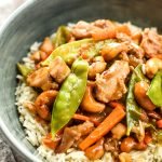 Easy Cashew Chicken Meal Prep - Toasted cashews, snow peas, carrots and juicy chicken in a garlicky cashew sauce - pair with rice for a super simple take-out style meal prep! - ProjectMealPlan.com